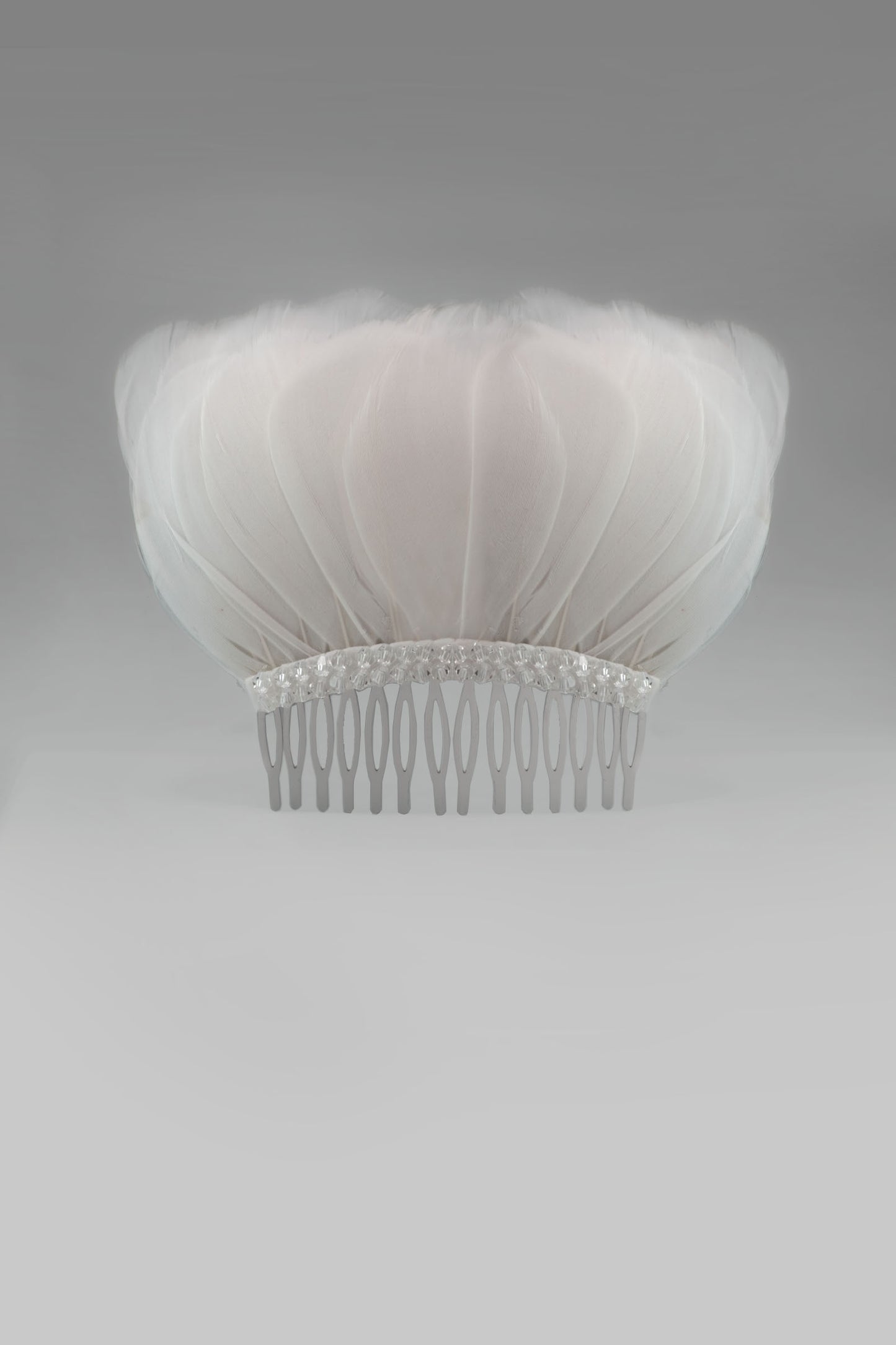 Looking for beautiful wedding hair accessories? Discover Bonito & Grace's stunning collection of bridal hair accessories and wedding day hair accessories. Bring a little sparkle with our feather and crystal wedding hair clip, Bridal hair accessories.