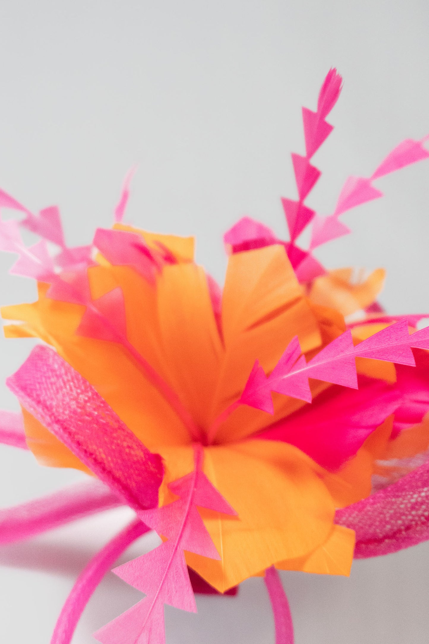 OLIVIA FASCINATOR CLIP PINK AND ORANGE