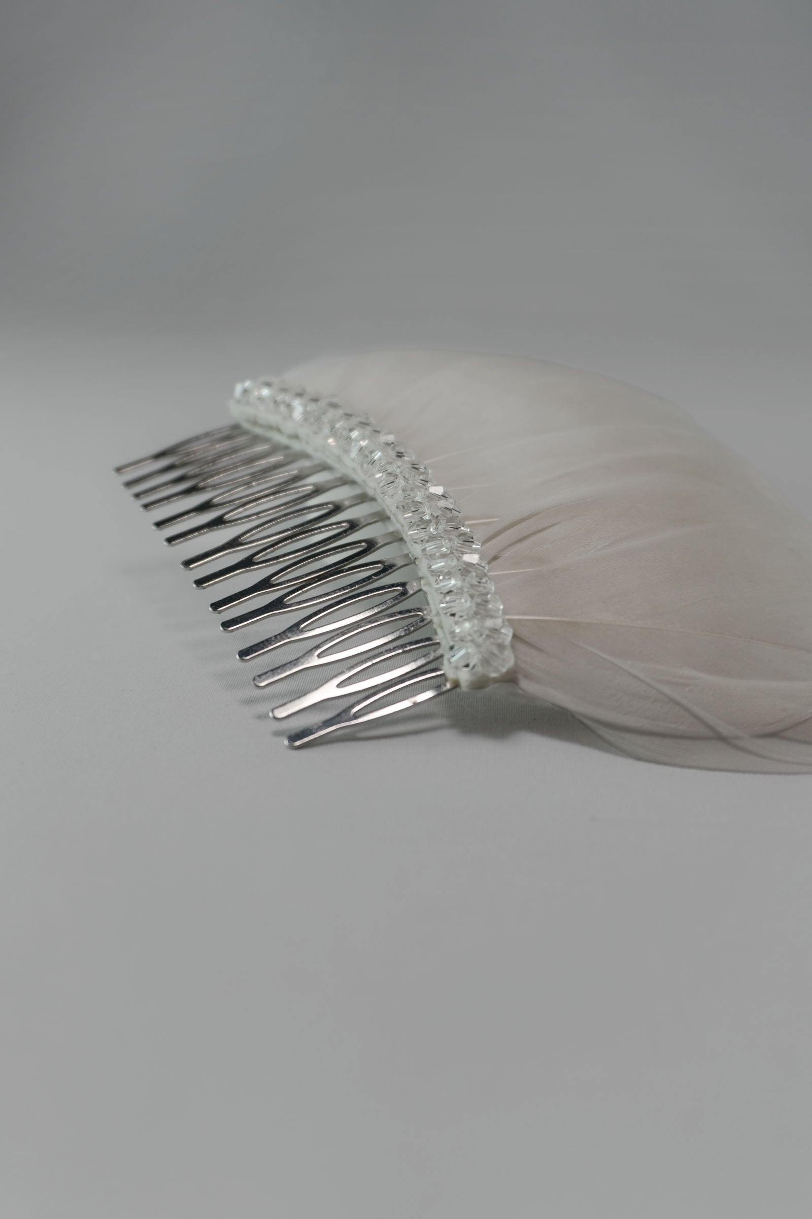 Looking for beautiful wedding hair accessories? Discover Bonito & Grace's stunning collection of bridal hair accessories and wedding day hair accessories. Bring a little sparkle with our feather and crystal wedding hair clip, Bridal hair accessories.